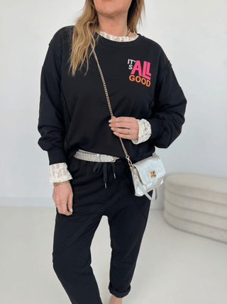 Sweater in Schwarz mit Print auf der Rückseite